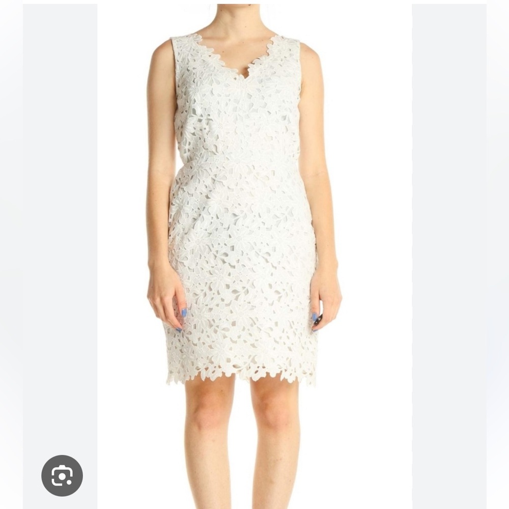Lipsy White Mini Dress with Chic Design